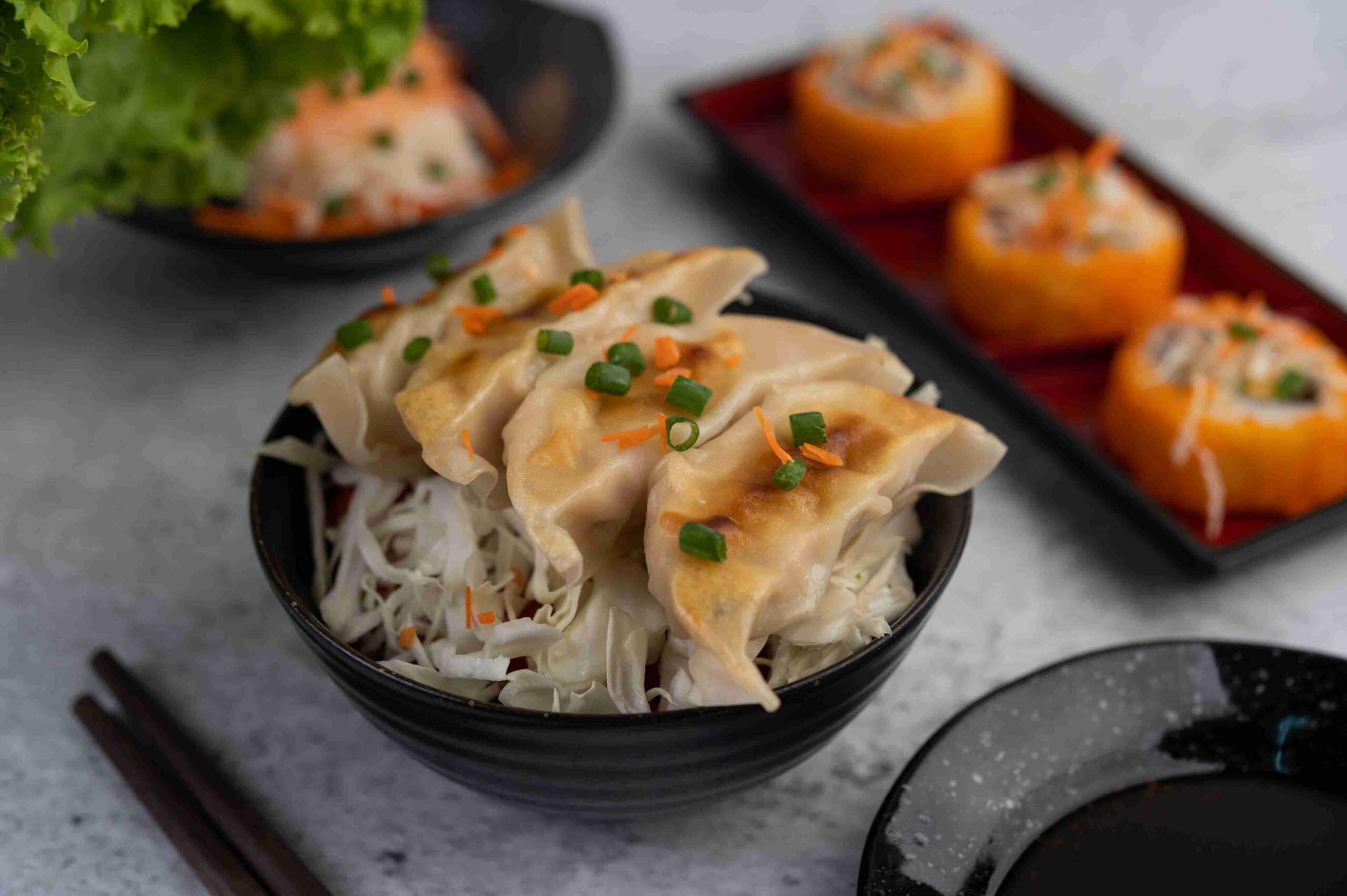 gyoza-black-cup-with-cup-sauce (1)