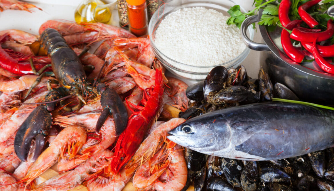 raw marine products and rice at kitchen